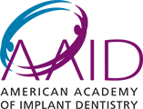 The image displays a logo with stylized text and graphics, including a purple and blue color scheme, representing an organization called  AIDA,  which stands for American Implant   Device Advocacy Association.