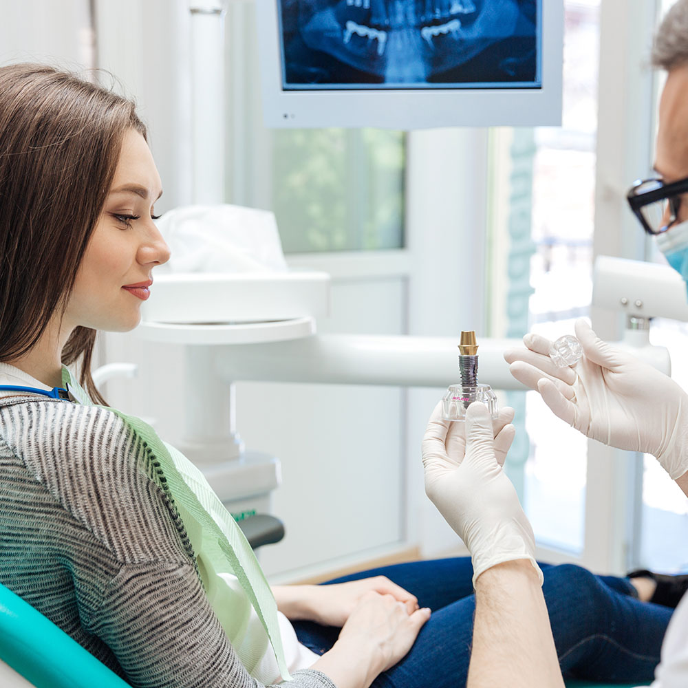 The image shows a woman sitting in a dental chair with a dentist administering a shot into her mouth while she holds a syringe of anesthetic, capturing different moments of this medical procedure.
